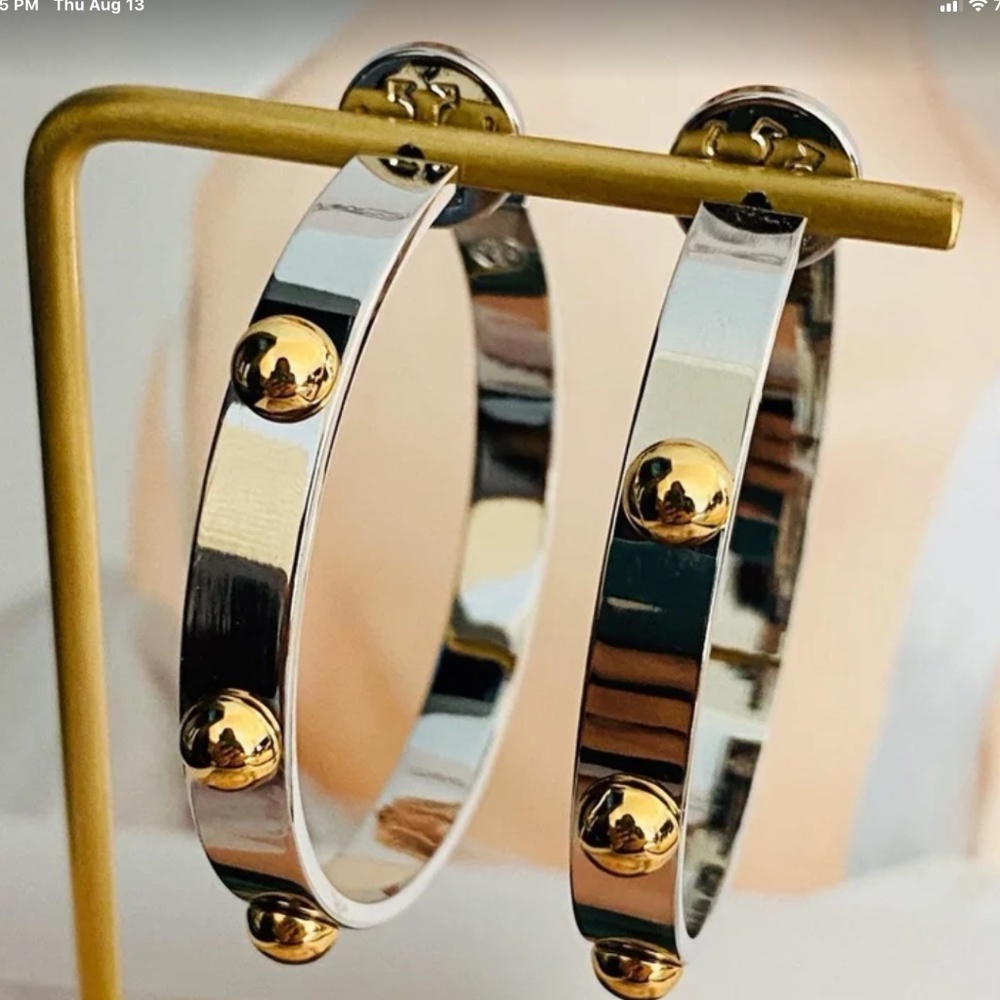 Tory Burch silver + gold hoop earrings